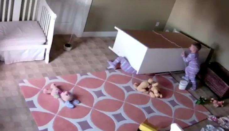 Two years kid saves his twin brother.jpg