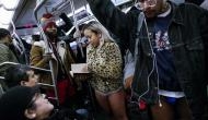 In photos: Stripping off for a laugh, subway riders worldwide go pantless 