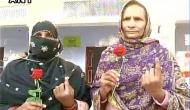 UP polls: ECI officials give red roses to all women voters in Baraut  
