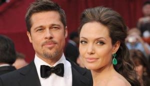 Brad Pitt eyeing Angelina Jolie's lookalike
