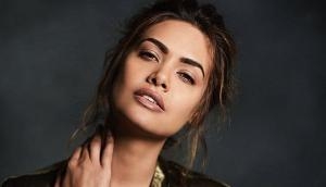 Esha Gupta trolled over sharing picture of 'alleged accused molester'; netizens suggest for defamation case