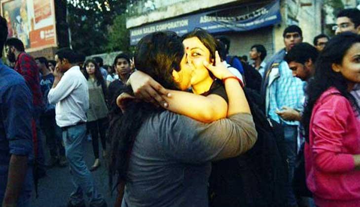 Love in the time of protests: Photo of a couple kissing near Sri