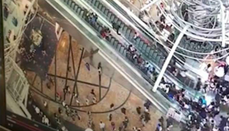 Hong Kong: Dozens injured as escalator moves in reverse direction