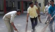 Armed with brooms, UP cops clean police stations