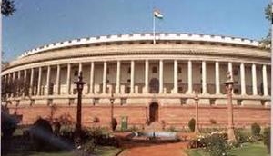 Parliament witnesses disruption as Oppn corners govt. over Tarun Vijay's remark