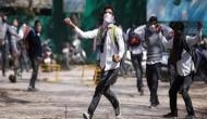 School students clash with security forces in Kashmir