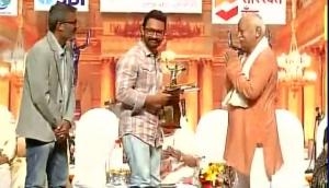 The new normal: Aamir Khan accepts award from RSS Chief Mohan Bhagwat