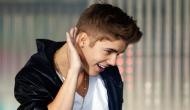 Justin Bieber hits photographer with his truck