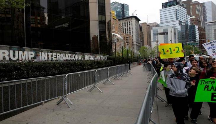 Artist projects provocative message on Trump International Hotel