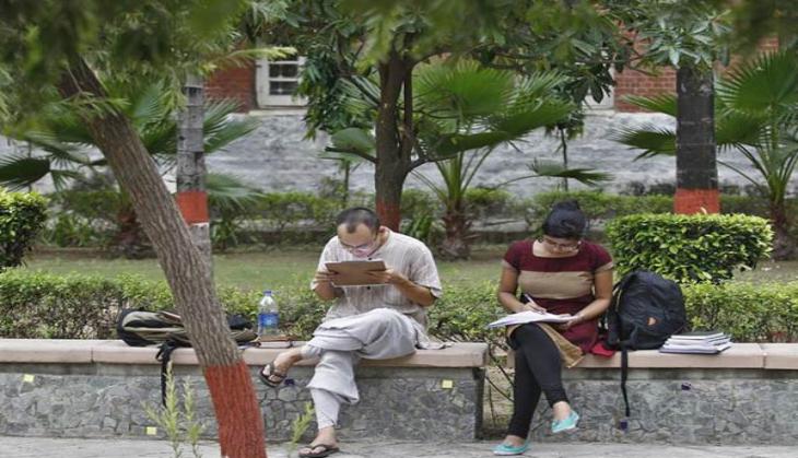 Textbooks tells students to write emails as short as skirts, sparks row
