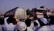 Maharashtra: Milk spilled on road as farmers go on strike