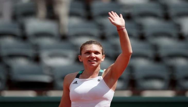 Simona Halep strolls into French Open quarters