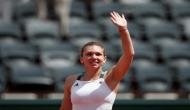 Simona Halep strolls into French Open quarters