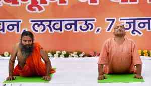 In pictures: Yogi's solution to crime in UP – Keep calm and do yoga with Ramdev