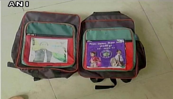Gujarat schoolchildren distributed bags with Akhilesh Yadav's photo