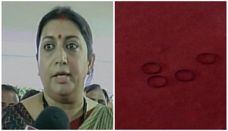 Bangles thrown at Smriti Irani in Gujarat, one detained