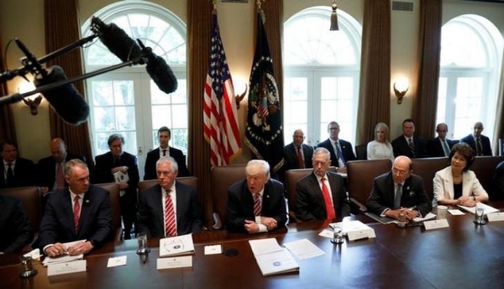 Trump showered with 'glowing tributes' in his first Cabinet meeting