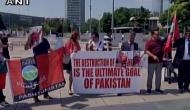 Geneva: Balochs protest against Pak atrocities in front of iconic 'Broken Chair'