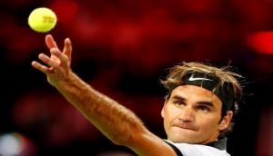 Federer shines bright in twilight zone