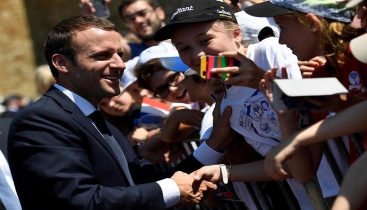 President Macron's party wins parliamentary poll majority