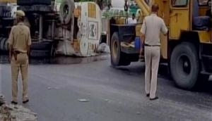 Delhi: Petrol spills on road as tanker overturns, traffic affected