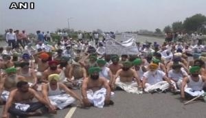 Punjab: Farmers protest over farm loan waiver issue on NH-1