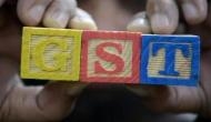 Mkt losses narrow, GST anxiety keeps investors on toes