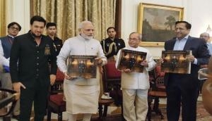 PM Modi released coffee table book, presented first copy to President of India on President Pranab Mukherjee - A Statesman