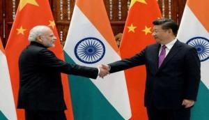 PM Modi meets Chinese President Jinping at BRICS informal gathering