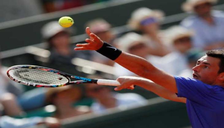 Tomic's father 'ashamed' of his son's Wimbledon antics