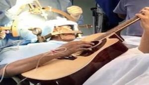 Incredible! Bengaluru man plays guitar during his brain surgery