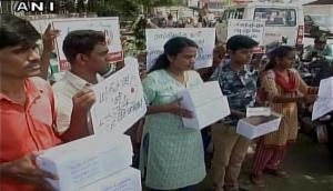 TN: Protesters attempt to parcel sanitary napkins to PM, FM in protest over 12 percent GST