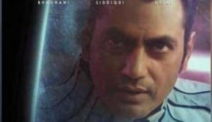 Nawazuddin Siddiqui looks out of the glass in 'Carbon'