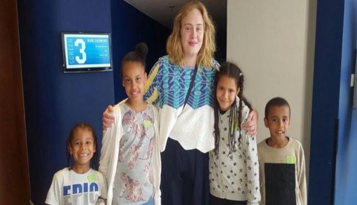 Adele takes Grenfell Tower survivors to private 'Despicable Me 3' screening