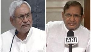 JD(U) passes resolution to join NDA, RJD calls it 'meaningless'