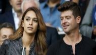 It's 'baby on board' for Robin Thicke, April Love!