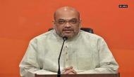 In Bengal, Amit Shah urges BJP workers to pay back in the same coin