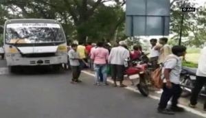Truck, school bus collide, kill one child, injure nine