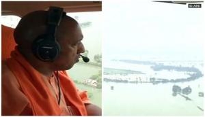 UP flood: UP CM Yogi Adityanath distributes flood relief material in Ballia and Azamgarh