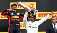 Hamilton holds off Vettel to win Belgian GP