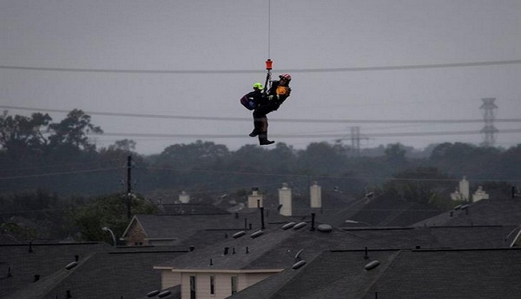 Harvey aftermath: 13,000 rescued, Houston imposes night curfew to prevent looting