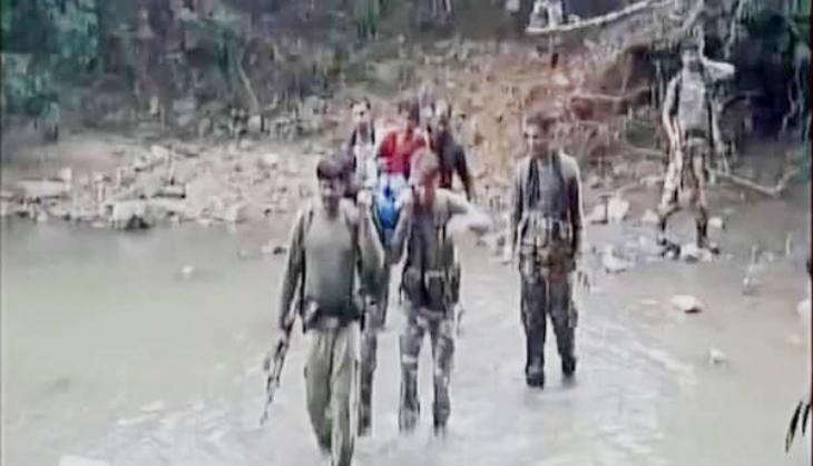 CRPF personnel carry woman suffering from high fever on stretcher for 7 km