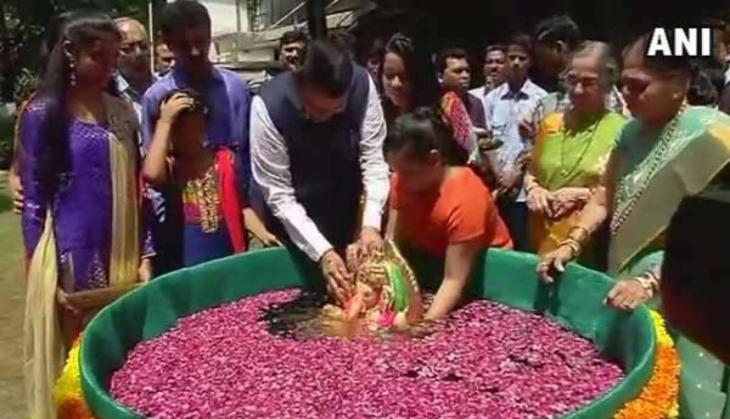 Maha CM Devendra Fadnavis  immerses Ganesha idol in artificial pond