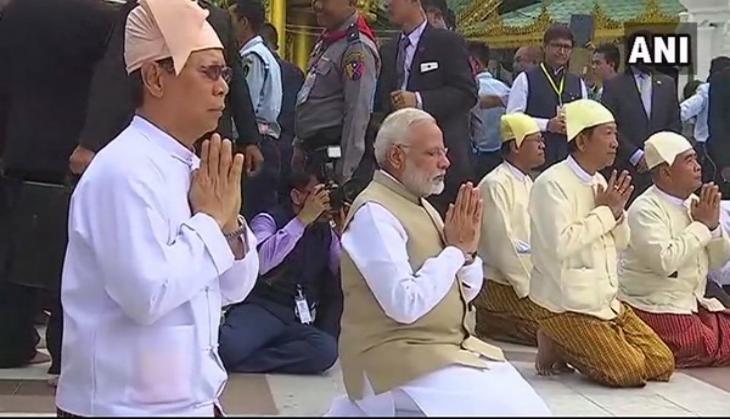 Prime Minister Modi signs guest book at Shwedagon Pagoda in Yangon