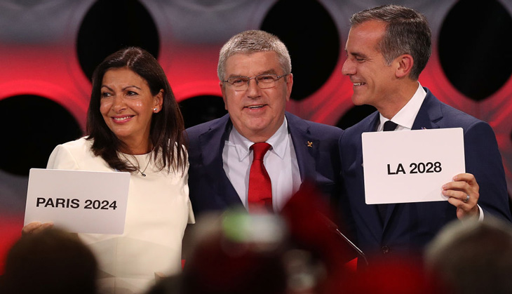 Paris and Los Angeles bids to host Olympics expose deeper crisis at Olympic Games