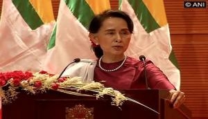 Myanmar defends Suu Kyi's silence over jailed reporters