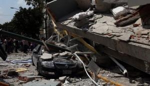 Mexico earthquake: Desperate parents pull children out of rubble after 7.1 aftershock