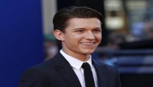 Tom Holland dazed, confused after losing wisdom tooth