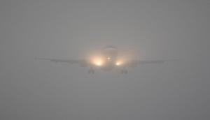 Delhi: Fog delays flights, trains
