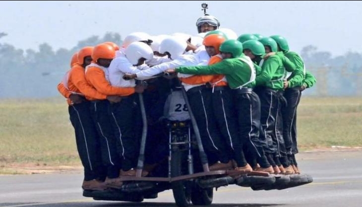 The Tornadoes 58 army men on single Royal Enfield World Record.jpg